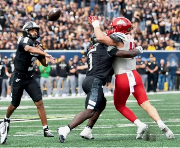 WVU QB trying to improve deep ball